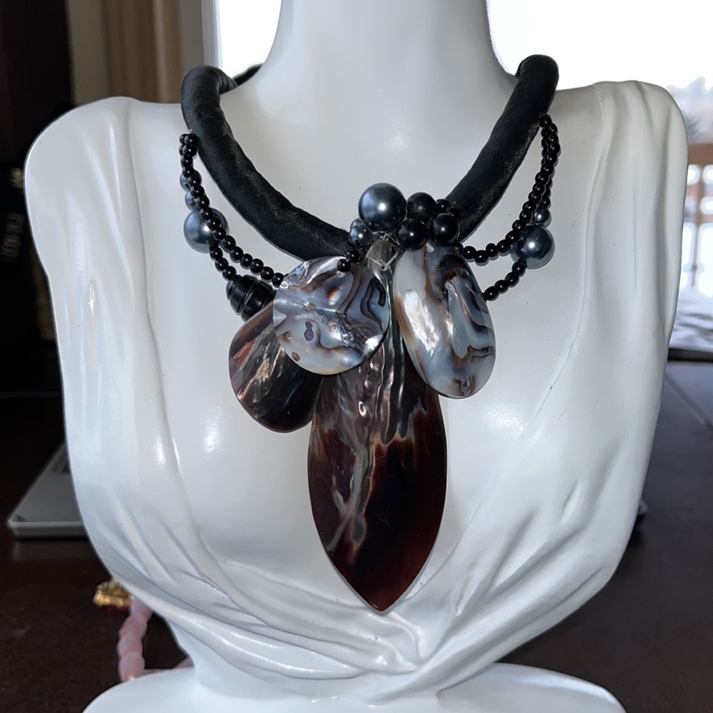 statement shell necklace with cloth band button clasp